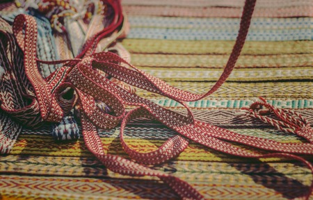 Bright red tape for crafts, ethnic Slavic Belt for clothesの写真素材