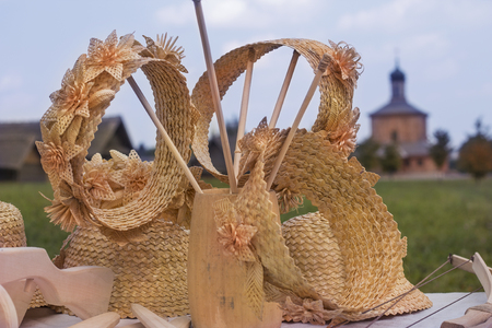 wreath on the head of woven straw, a traditional Slavic women's jewelryの写真素材