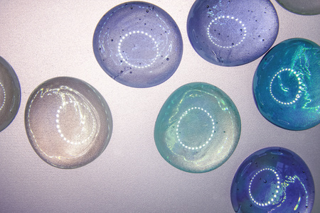 background from multi-colored glass spheres with backlight.の写真素材