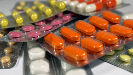 a set of various tablets and capsules in blisters.の写真素材