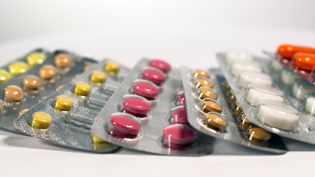 a set of various tablets and capsules in blisters.の写真素材
