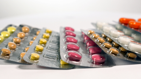 a set of various tablets and capsules in blisters.の写真素材