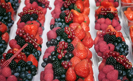 dessert portion of ripe berries: raspberries, strawberries blueberriesの写真素材