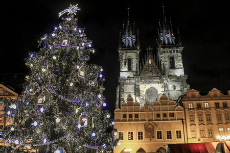 Christmas tree near Tyn Church in Prague's main square in Czech Republic.の写真素材