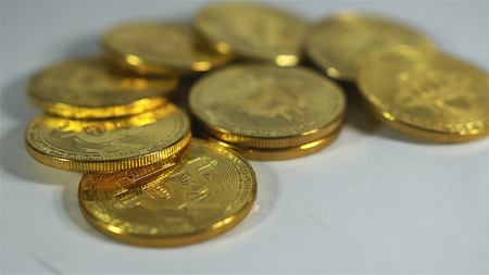 Rotating Stack Of Gold Bitcoins On Turntable.の写真素材