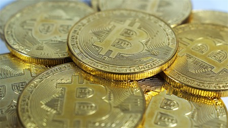 Rotating Stack Of Gold Bitcoins On Turntable.の写真素材