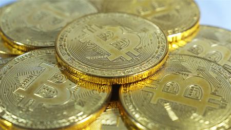 Rotating Stack Of Gold Bitcoins On Turntable.の写真素材