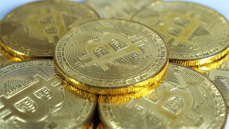 Rotating Stack Of Gold Bitcoins On Turntable.の写真素材
