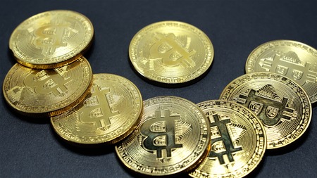 Rotating Stack Of Gold Bitcoins On Turntable.の写真素材