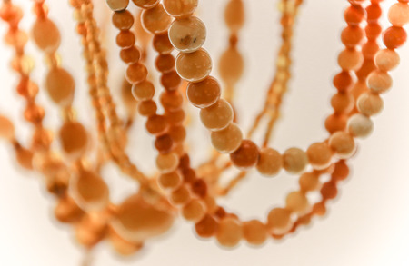 Simple beads made from natural yellow amber. Beads close-upの写真素材