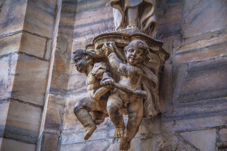 statues and decorative elements on the facade of the Duomo in Milan.の写真素材