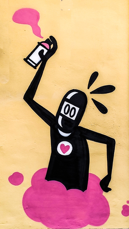 Valencia, Spain - January 2019: Colorful original graffiti on the wall of a building, street drawing, great background in a public place. Author unknownのeditorial素材