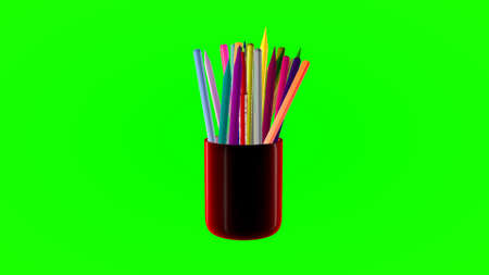 Rotating glass with colored pencils on a green background. 3d renderingの写真素材