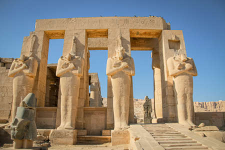 Ruins of the Egyptian temple of Ramesseum, the funeral temple of Pharaoh Ramses II XIII century BC, near the modern city of Luxor.の写真素材