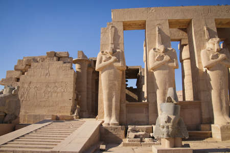 Ruins of the Egyptian temple of Ramesseum, the funeral temple of Pharaoh Ramses II XIII century BC, near the modern city of Luxor.の写真素材