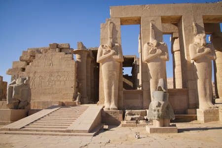 Ruins of the Egyptian temple of Ramesseum, the funeral temple of Pharaoh Ramses II XIII century BC, near the modern city of Luxor.の写真素材