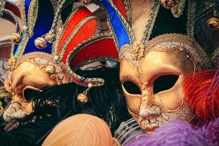 bright colorful carnival masks in Venice, Italyの写真素材