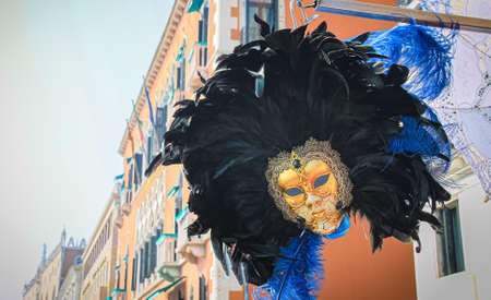 bright colorful carnival masks in Venice, Italyの写真素材