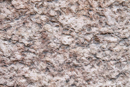 Light background from natural limestone. Texture of natural stone with cracks.の写真素材