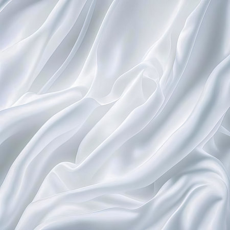 Solid background of white silk silky satin fabric.の素材
