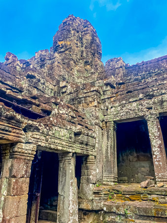The three-level Mount Bayon Temple, a temple of the Khmer civilization, located on the territory of Angkor in Cambodia.の写真素材
