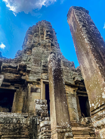 The three-level Mount Bayon Temple, a temple of the Khmer civilization, located on the territory of Angkor in Cambodia.の写真素材