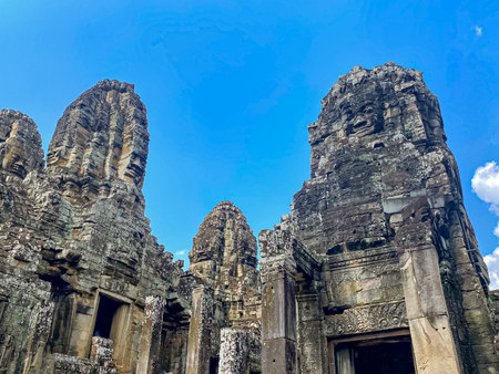 The three-level Mount Bayon Temple, a temple of the Khmer civilization, located on the territory of Angkor in Cambodia.の写真素材