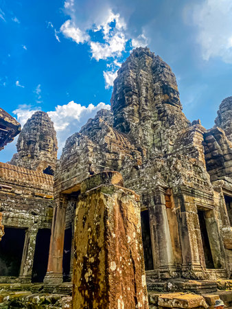 The three-level Mount Bayon Temple, a temple of the Khmer civilization, located on the territory of Angkor in Cambodia.の写真素材