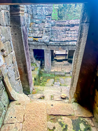The three-level Mount Bayon Temple, a temple of the Khmer civilization, located on the territory of Angkor in Cambodia.の写真素材