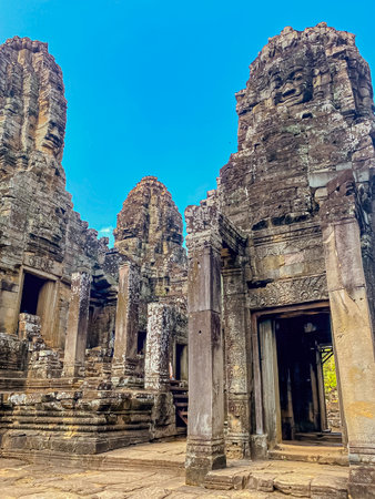 The three-level Mount Bayon Temple, a temple of the Khmer civilization, located on the territory of Angkor in Cambodia.の写真素材