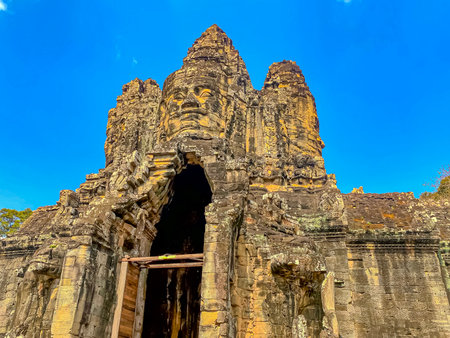 The three-level Mount Bayon Temple, a temple of the Khmer civilization, located on the territory of Angkor in Cambodia.の写真素材