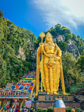 Batu Caves in Kuala Lumpur, golden statue of god Murugan.の写真素材