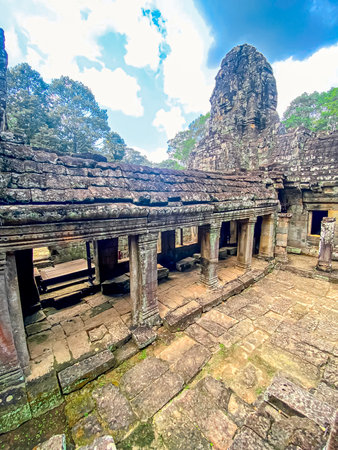 The three-level Mount Bayon Temple, a temple of the Khmer civilization, located on the territory of Angkor in Cambodia.の写真素材
