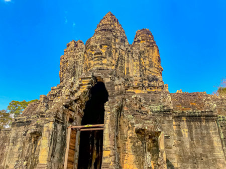 The three-level Mount Bayon Temple, a temple of the Khmer civilization, located on the territory of Angkor in Cambodia.の写真素材