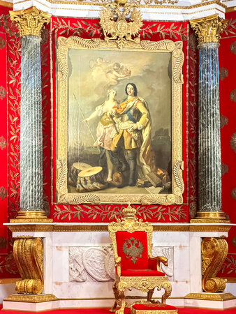 The luxurious interiors of the Peter the Great Hall (Small Throne Room) in the Hermitage Museum in St. Petersburg, Russiaの写真素材