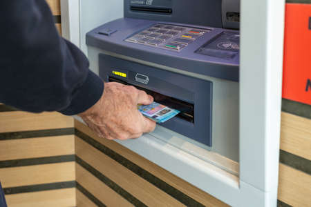 Money at atm, getting money from cash machineの写真素材
