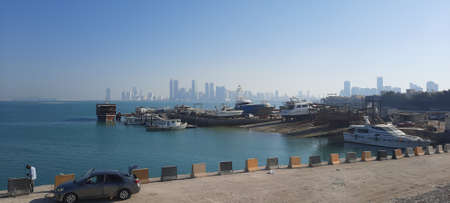 Manama, Bahrain - February 14 2021: City view of a road running along a coast. Manama, Capital of Bahrain.のeditorial素材