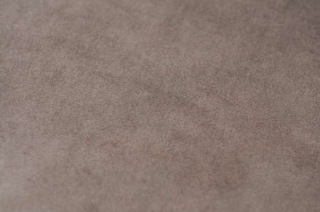 The texture of the fabric is velor beige. Background Velvet upholstery furnitureの写真素材