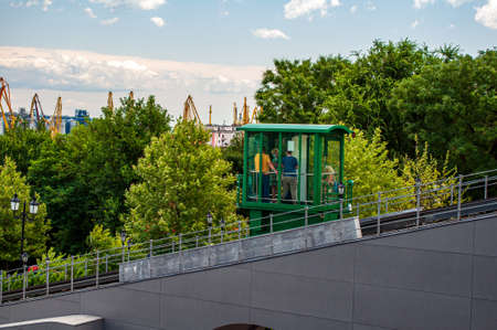 Odessa, Ukraine. July 22. 2021. Funicular in Odessa near the Potemkin Stairs. Green trailers on the...