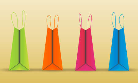 Vector colorful shopping bags on yellow backgroundのイラスト素材