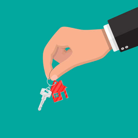 Hand holds metal key with keychain house in flat style. Buy, rental or lease a house. Vector illustrationのイラスト素材
