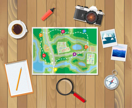 Wooden table with paper map. Photo camera and photos, notepad with pencil, compass, marker, coffee cup, magnifying glass. Planning trip. Vector illustration in flat styleのイラスト素材