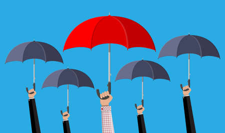 Man with red umbrella in the crowd with grey umbrellas. Human diversity, uniqueness and...