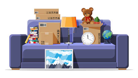 Moving to new house. Family relocated to new home. Sofa with paper cardboard boxes with various...