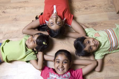 young kids huddled together