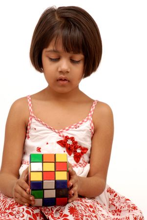 indian little girl with rubic cubeのeditorial素材