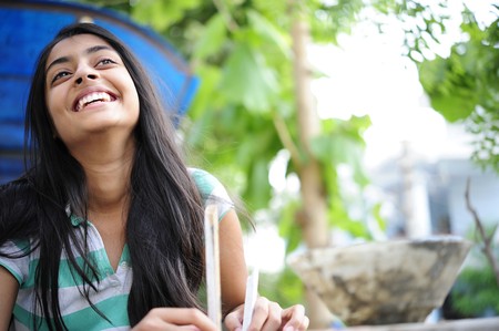 portarait of beautiful smiling indian girl の写真素材