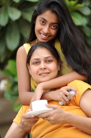 Mother relaxing with daughter 