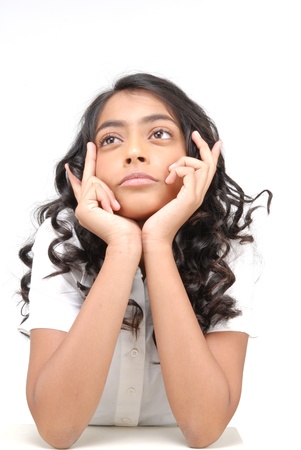 Beautiful Indian girl with curly hair showing gesture
の写真素材