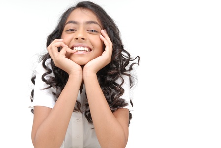 Beautiful Indian girl with curly hair showing gesture
の写真素材